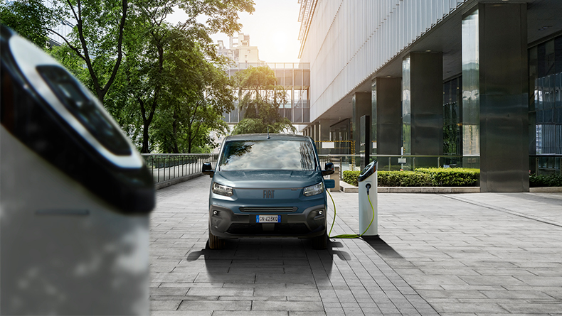 Fiat Professional utility vehicle parked near warehouse